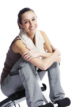 Young Woman In Fitness Clothing Resting After Exercise