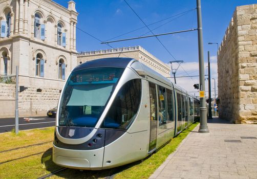 JERUSALEM - OCT 6 : The new modern light rail train crossing the old city of Jerusalem on October 6 2011 