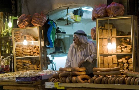 JERUSALEM - OCTOBER 06 2011 : Palestinian bread seller in the old city of Jerusalem , Israel