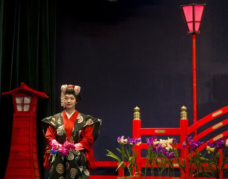 NIKKO , JAPAN - OCT 30 : An unidentified performer in the "Water magic" show held on October 30 2009 in Nikko Japan , "Water magic" is a Japanese traditional theater art  