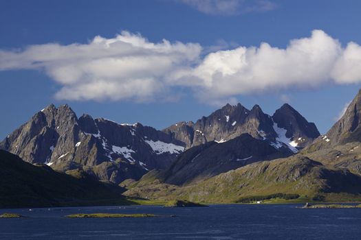 Picturesque towering mountains on island of Moskenesoya, Lofoten islands, Norway