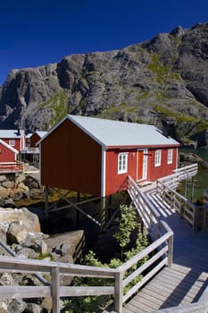 Traditional norwegian fishing hut in village of Nusfjord on Lofoten islands in Norway