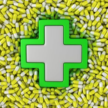 Medical cross sign on the yellow pills background