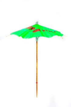 One cocktail umbrella on a white background