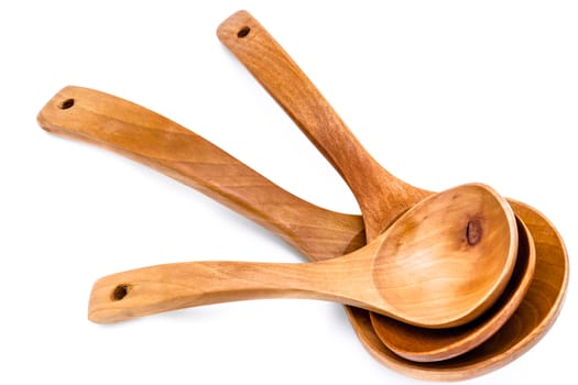 Group of wooden spoon on a white background