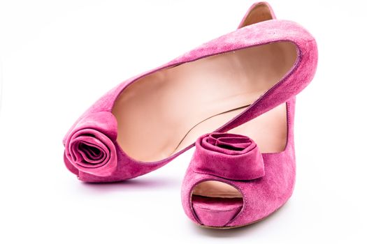 Pair of pink  dress women shoes isolated over white