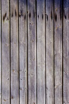 Wooden plank wall closeup detail background. Rural architecture.