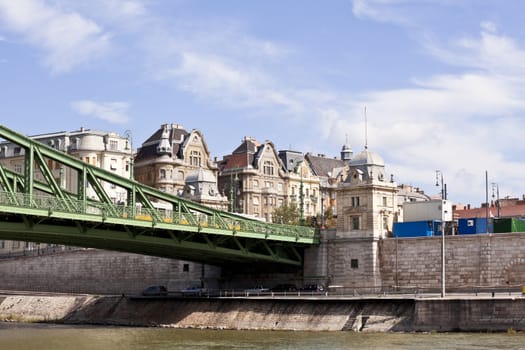 bridge and building on the bank of danube river in budapest, hungary