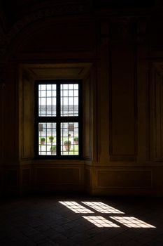 Mantua, Italy. July 13, 2021.  the sunlight coming in through the window and reflecting on the floor