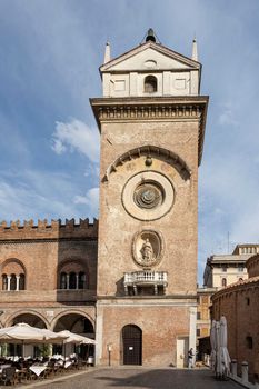   Mantua, Italy. July 13, 2021.  view of the clock tower in Piazza delle Erbe in the city center