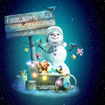 Happy snowman standing in winter christmas landscape.