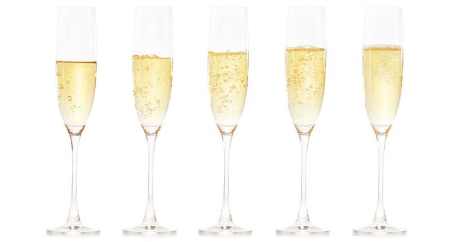 Glasses of champagne with splash, celebration theme concept