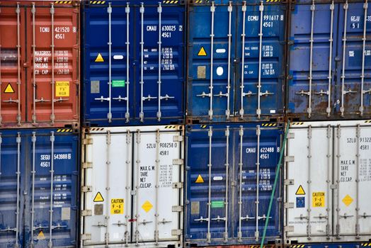 Stack of Freight shipping containers at the docks.