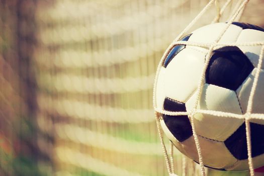 Traditional soccer game with a leather ball