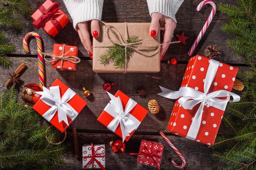 Gift box in craft wrapping paper with satin ribbon. Christmas, New year banner