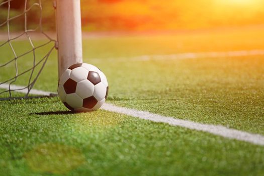 Traditional soccer game with a leather ball