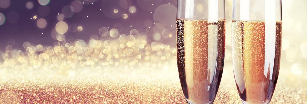 Glasses of champagne with splash, celebration theme concept