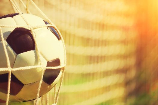 Traditional soccer game with a leather ball