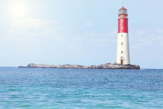 Beautiful summer seascape with lighthouse and sky