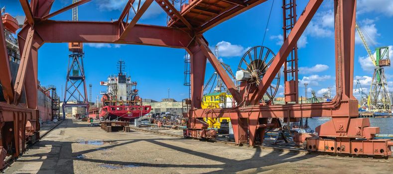 Chernomorsk, Ukraine. 21.03.2021. Big ship at the pier in the Chernomorsk Shipyard on a sunny spring day