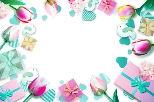 Creative layout with flowers and gifts. Spring minimal concept. Nature background.