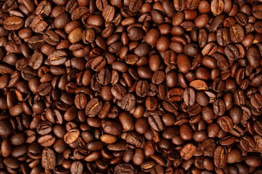 Roasted brown coffee beans,  top view background