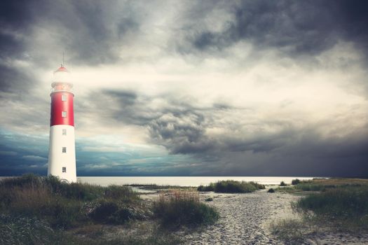 Beautiful summer seascape with lighthouse and sky