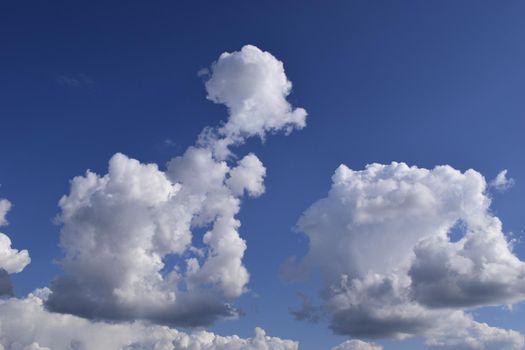 Beautiful blue sky with clouds background. Sky with clouds weather nature clouds and blue sky with sun. Aerial sky and clouds background.