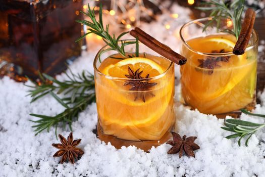 Negroni cocktail. Bourbon with cinnamon with oranges juice and star anise.The perfect cozy cocktail for chilly December evenings.