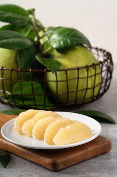 Fresh pomelo on gray cement background for Mid-Autumn Festival fruit.