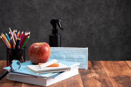 Back to school student design concept, close up of stationery over wooden table background with copy space.