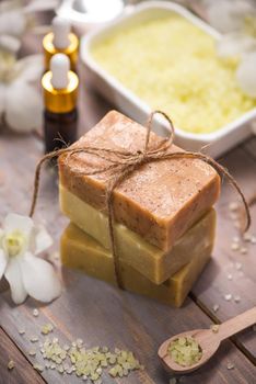 Handmade Soap and Aroma Oil with Flower branch. Spa products.