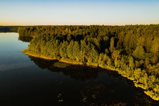 Top view of the lake Bolta in the forest in the Braslav lakes National Park, the most beautiful places in Belarus.An island in the lake.Belarus