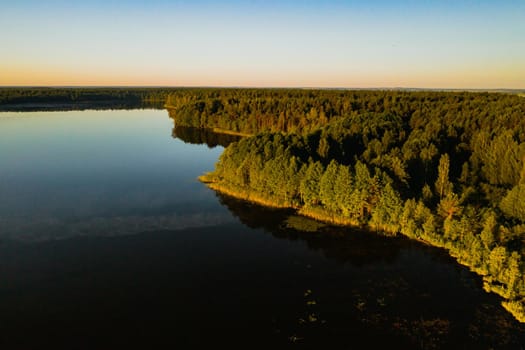 Top view of the lake Bolta in the forest in the Braslav lakes National Park, the most beautiful places in Belarus.An island in the lake.Belarus