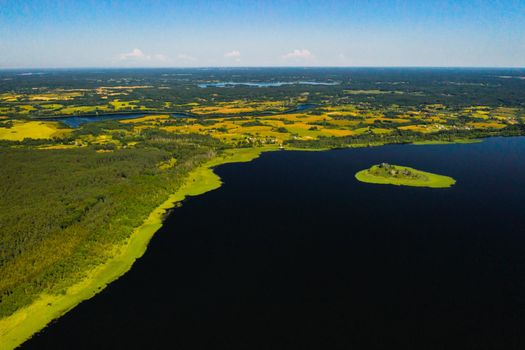 Top view of lake Drivyaty in the Braslav lakes National Park, the most beautiful lakes in Belarus.An island in the lake.Belarus