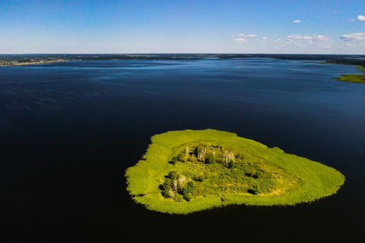 Top view of lake Drivyaty in the Braslav lakes National Park, the most beautiful lakes in Belarus.An island in the lake.Belarus