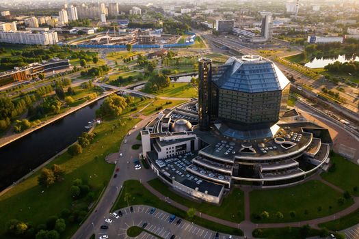 Top view of the National library and a new neighborhood with a Park in Minsk-the capital of the Republic of Belarus at sunset, a public building.