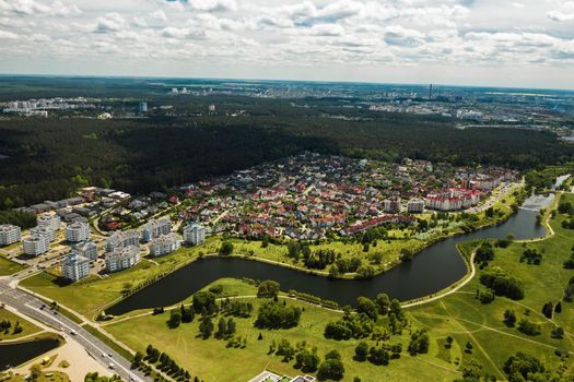 aerial photography from above of a large number of houses in the Eastern district of Minsk.The district of the city of Minsk the river Svisloch.Belarus.