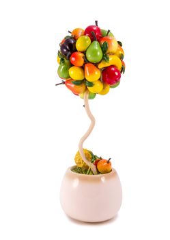 Fruit tree made of artificial fruits in pot