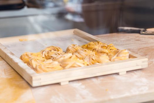 Making homemade italian pasta tagliatelle