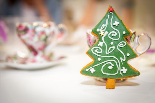 Holiday gingerbread cookie in shape of christmas tree