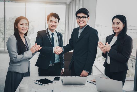 Business Partners Executive Greetings Handshake After Conference Agreement Deal Together, Businesspeople Executive Shaking Hands Togetherness in Meeting Room., Business Partnership Team Concept.