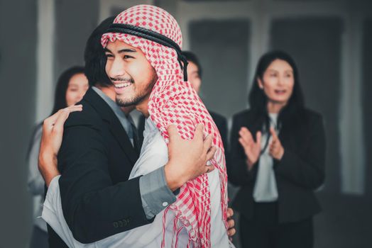 Business Partners Greetings Embrace After Conference Agreement Deal Together, Businesspeople Multicultural are Embracing Hug Togetherness in Meeting Room., Business Partnership Team Concept.