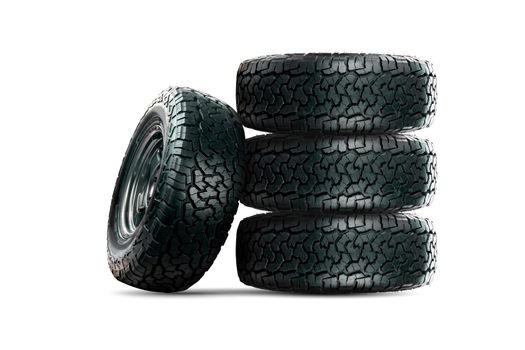 Set of 4 wheels car tires designed for use in all road conditions isolated on white background.