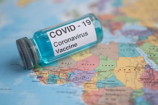 Bangkok, Thailand - July 1, 2021, Coronavirus Covid-19 vaccine on Africa map, development medical for doctor use to treat pneumonia illness patients.