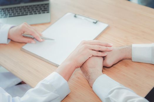 Medical Doctor is Encouraging and Health Care Consultation to Patient in Examination Room, Female Medicine Doctor Giving Encouragement and Consulting Health Problem to Male Patient. Encourage Concept