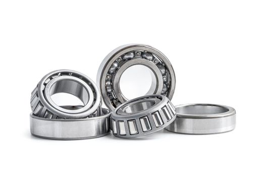 Ball bearing stainless metal roller for machine industrial, angular contact isolated on white background with clipping path.