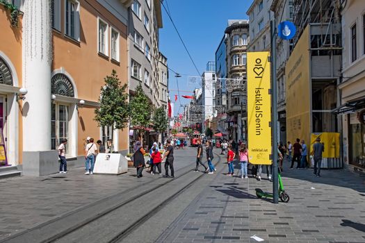 istanbul,turkey-august 28,2021.Street view from Istiklal Street with its historical and modern buildings in summer season with tourists and visitors in istanbul.