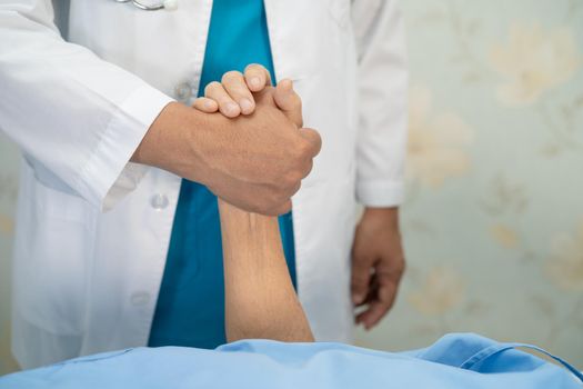 Holding hands Asian senior or elderly old lady woman patient with love, care, encourage and empathy at nursing hospital ward, healthy strong medical concept