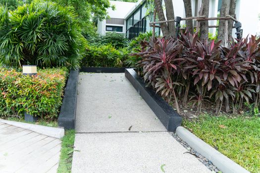 Building entrance trail with ramp for elder old or cannot self help people disabled person wheelchair.